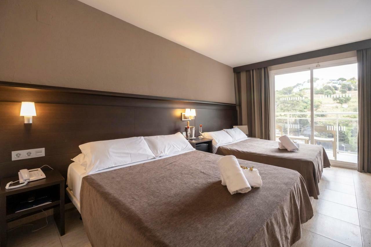 Camera Matrimoniale con Letto Supplementare (2 Adulti + 2 Bambini)